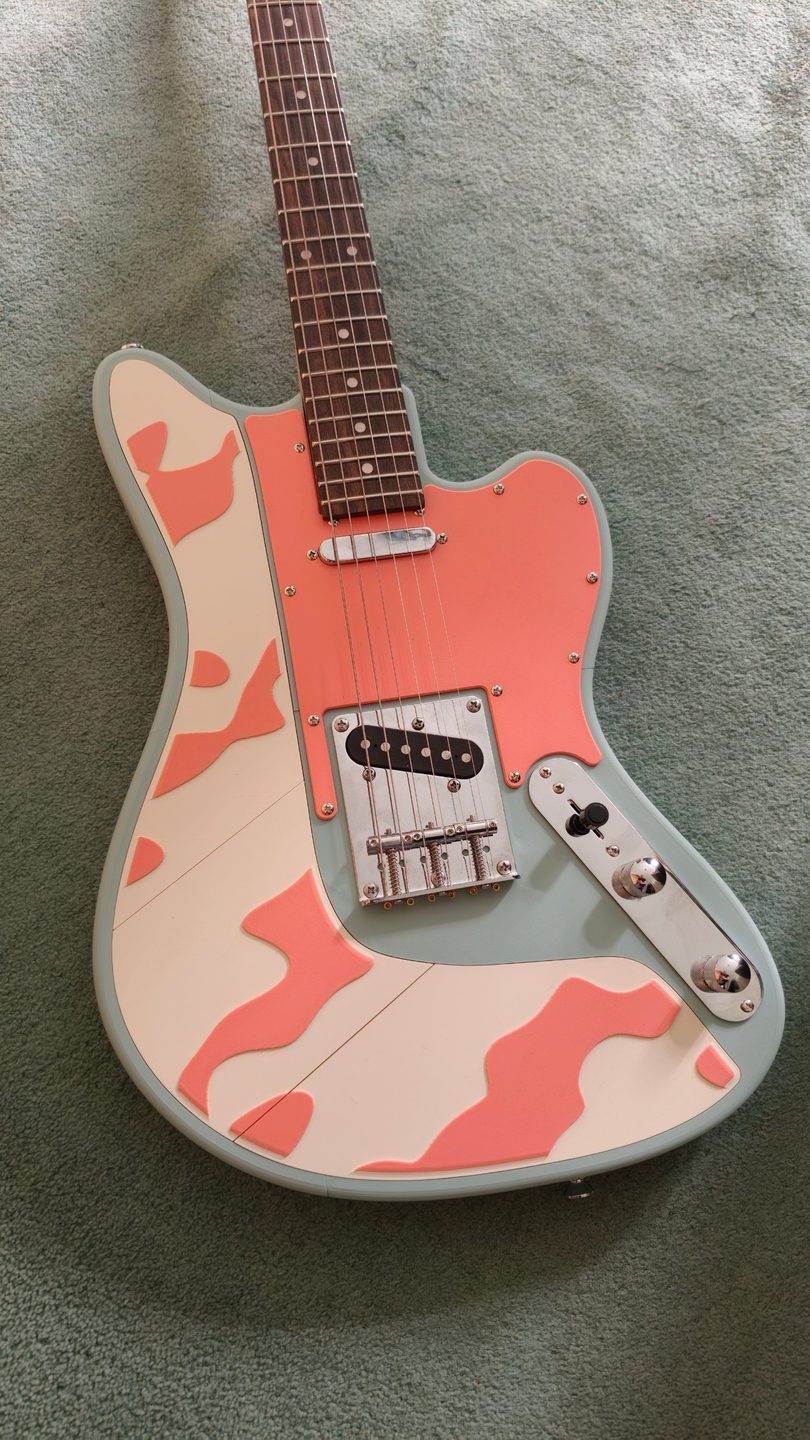 Same guitar with two-tone Camo plates clipped on.